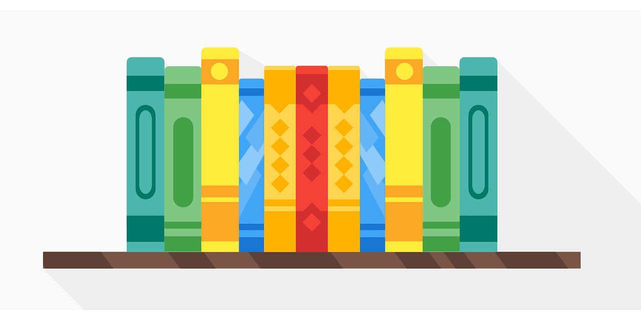 book-g3a7b044d1_1280 Colorful bookshelf with decorative books for interior design inspiration.