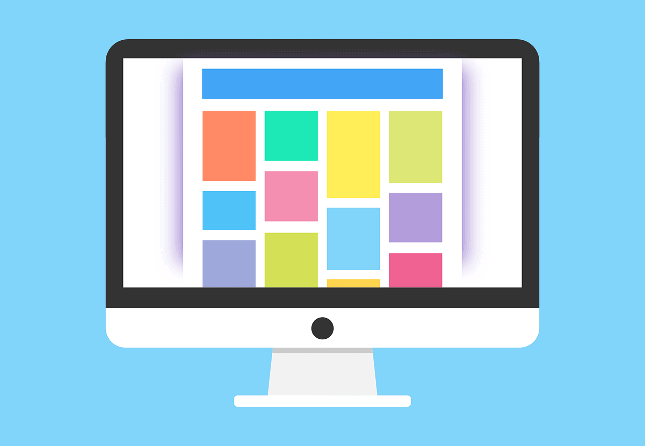 Modern website design displayed on a computer monitor, showcasing colorful layout and user-friendly.